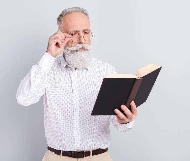 myths Photo of minded smart old man wear glasses red book novel wear white shirt isolated on grey color background Photo of minded smart old man wear glasses red book novel wear white shirt isolated on grey color background
